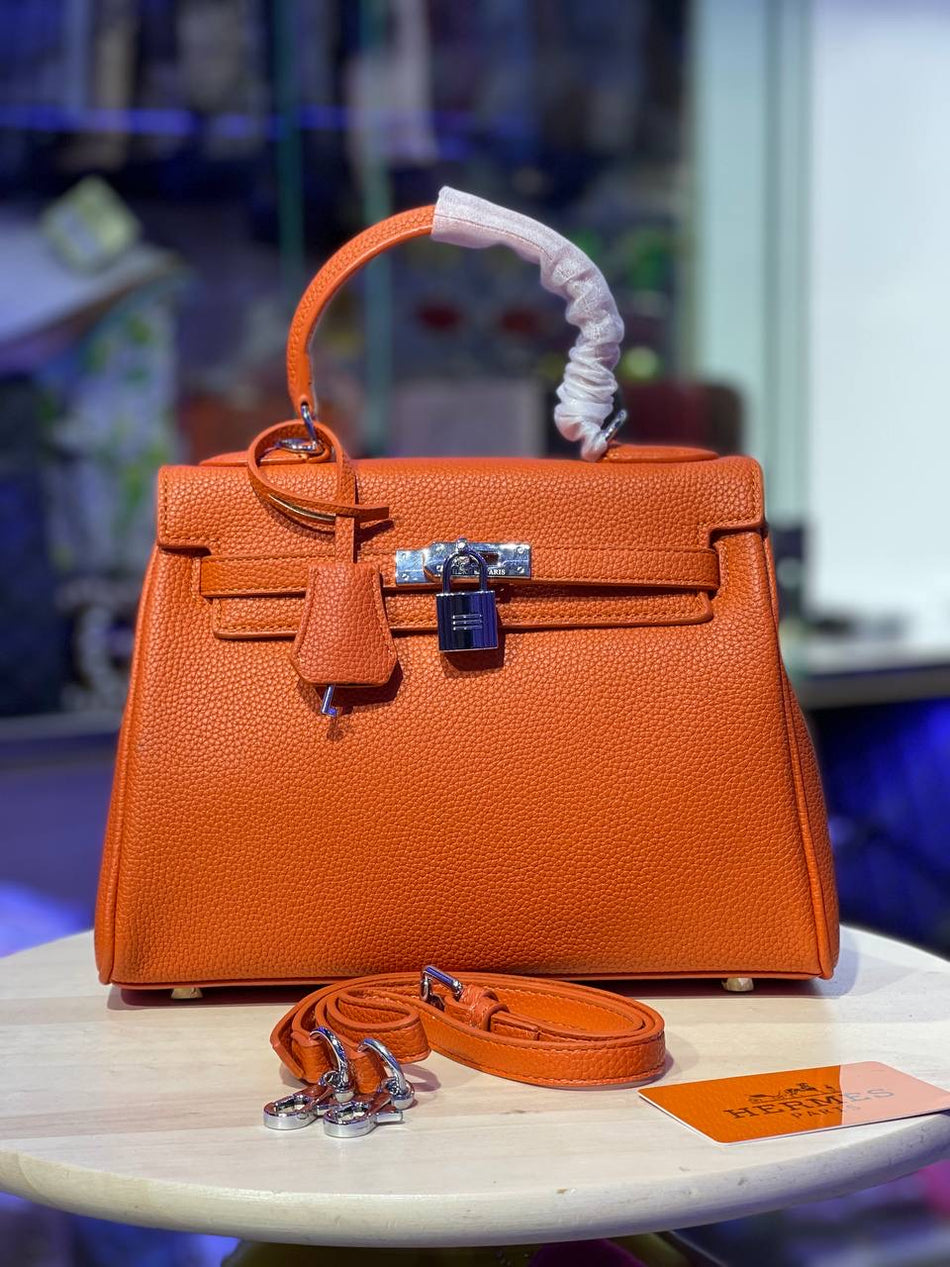 SAC HERMES KELLY RETOURNE ENVRAI CUIR ORANGE Montres Maroc Authentiques a prix bas