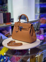 SAC HERMÈS KELLY RETOURNE EN VRAI CUIR MARRON CLAIR