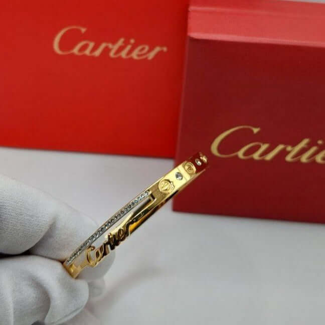 Bracelet femme acier doré Cartier vise strass