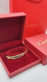 Bracelet femme acier doré Cartier vise strass